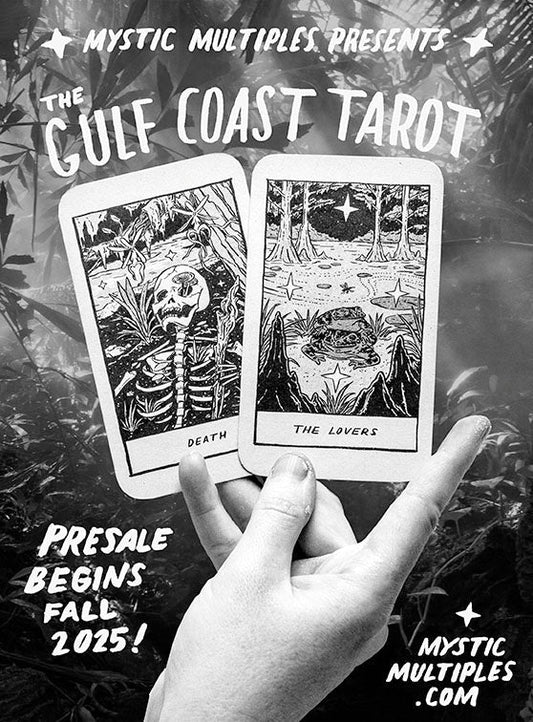 Mystic Multiples Presents: the gulf coast tarot. presale begins fall 2025! mysticmultiples.com. Black and white ad with hand holding two tarot cards- death and the lovers.