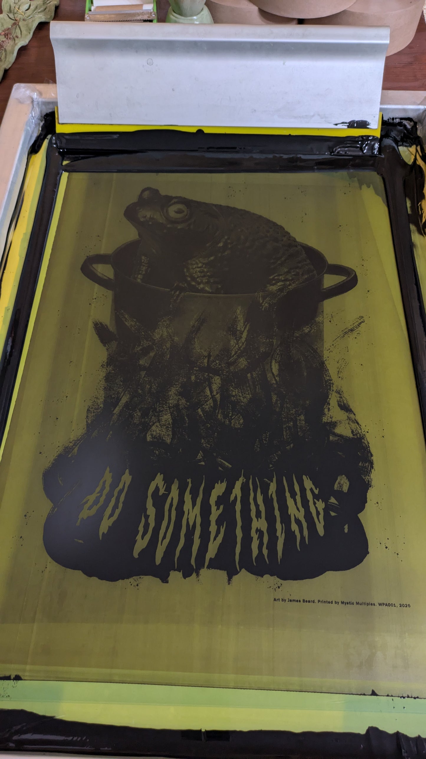 Printing the black ink with a screen.