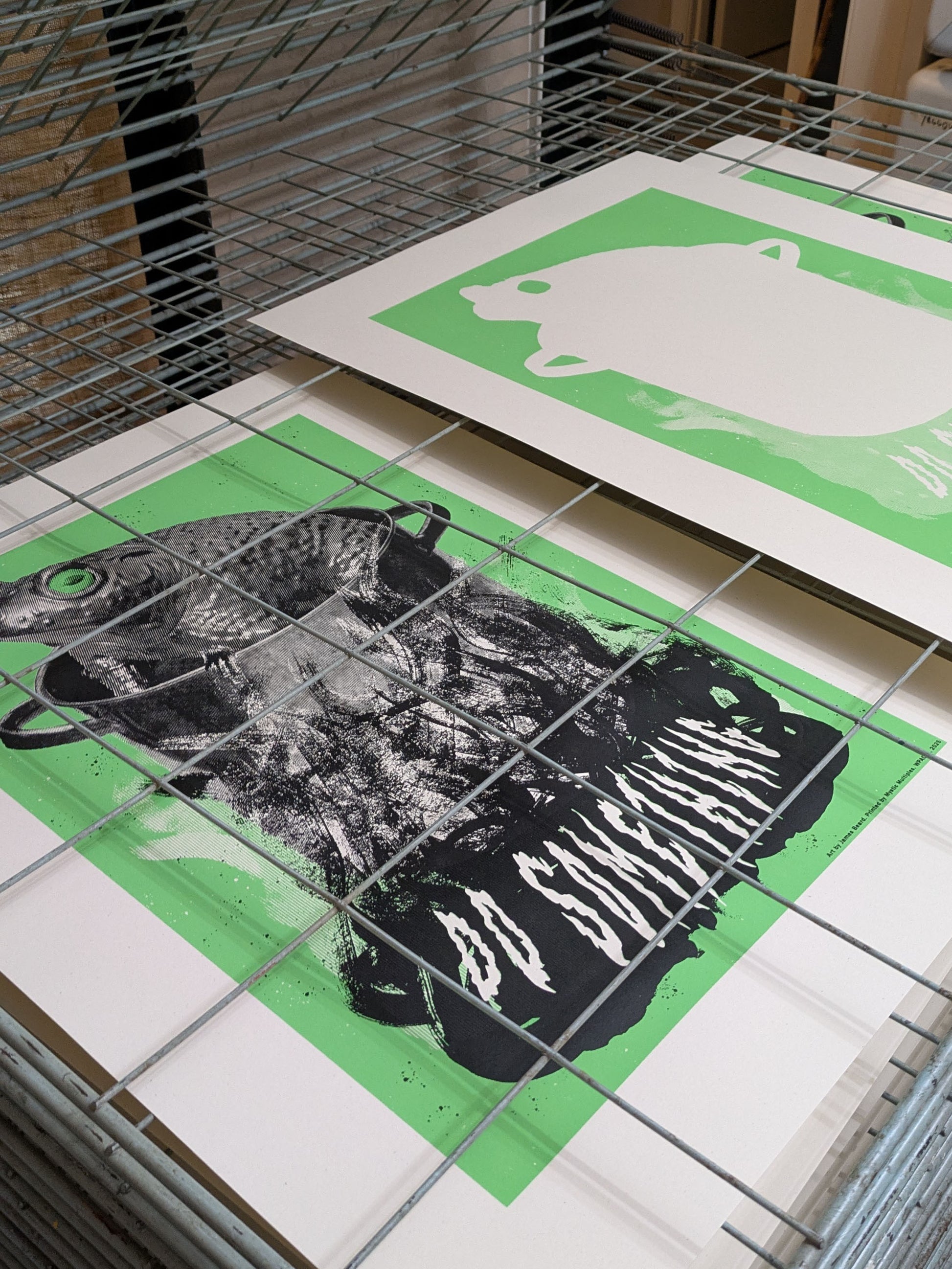 Green and black ink layers side by side
