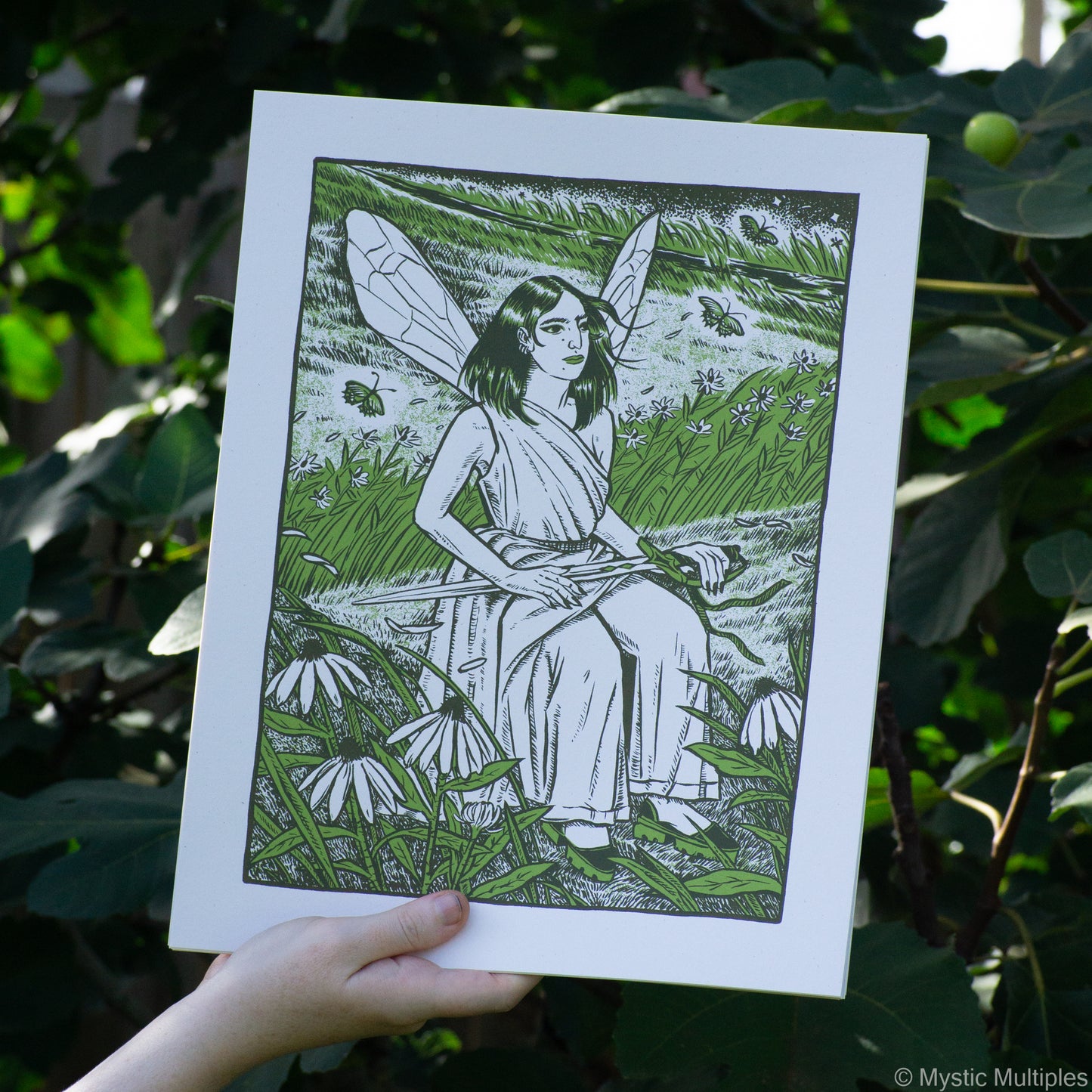 The queen of swords sitting in a prairie, sword in lap, surrounded by glowing butterflies