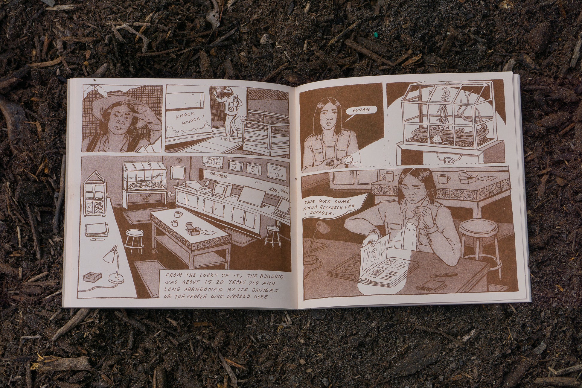 Inner pages of the comic show a woman entering a shed and discovering a research lab within.