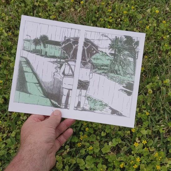 Video showing front and back of risograph art print 'Umbrella Share'