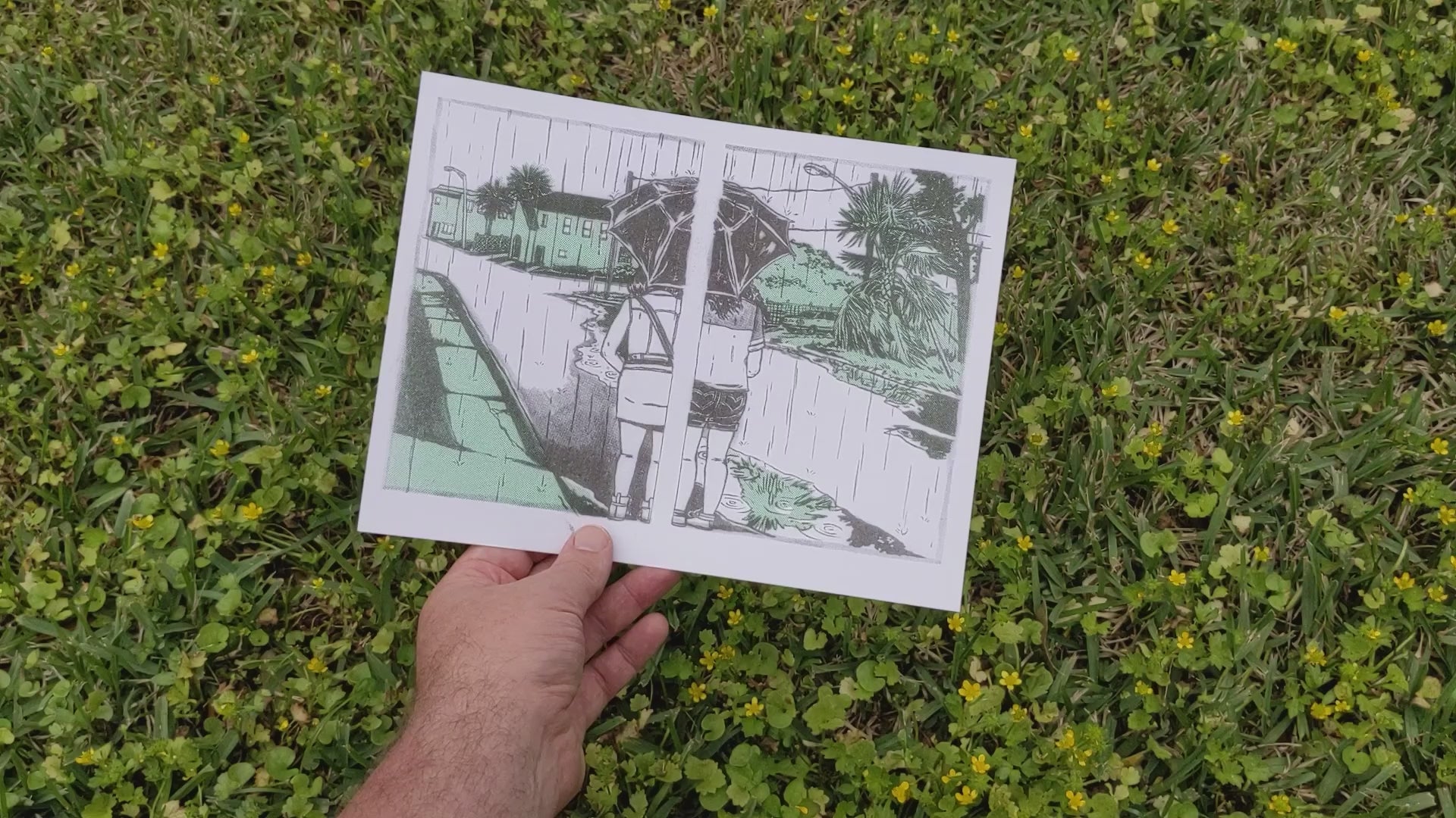 Video showing front and back of risograph art print 'Umbrella Share'